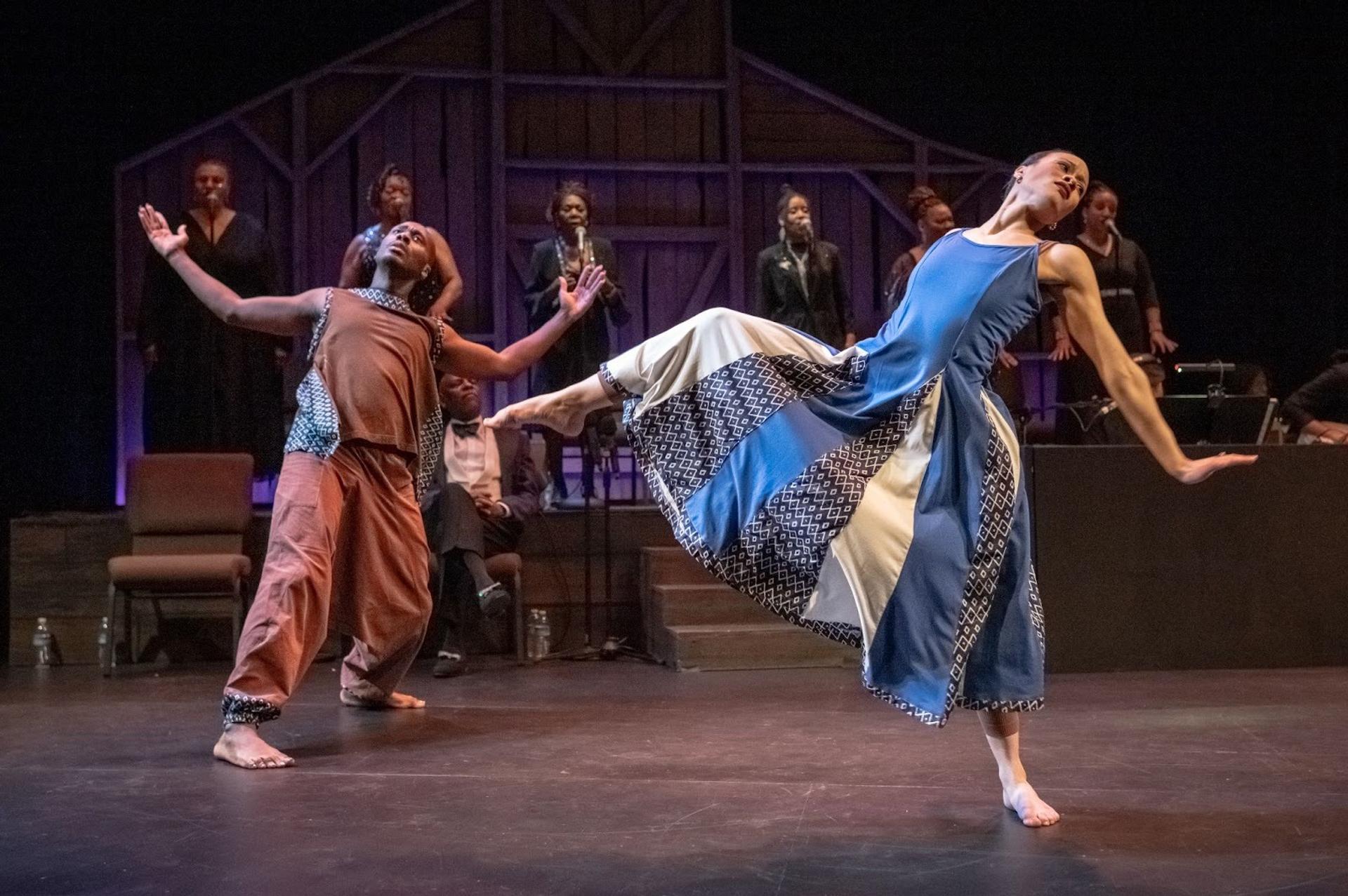 Two people dancing on stage