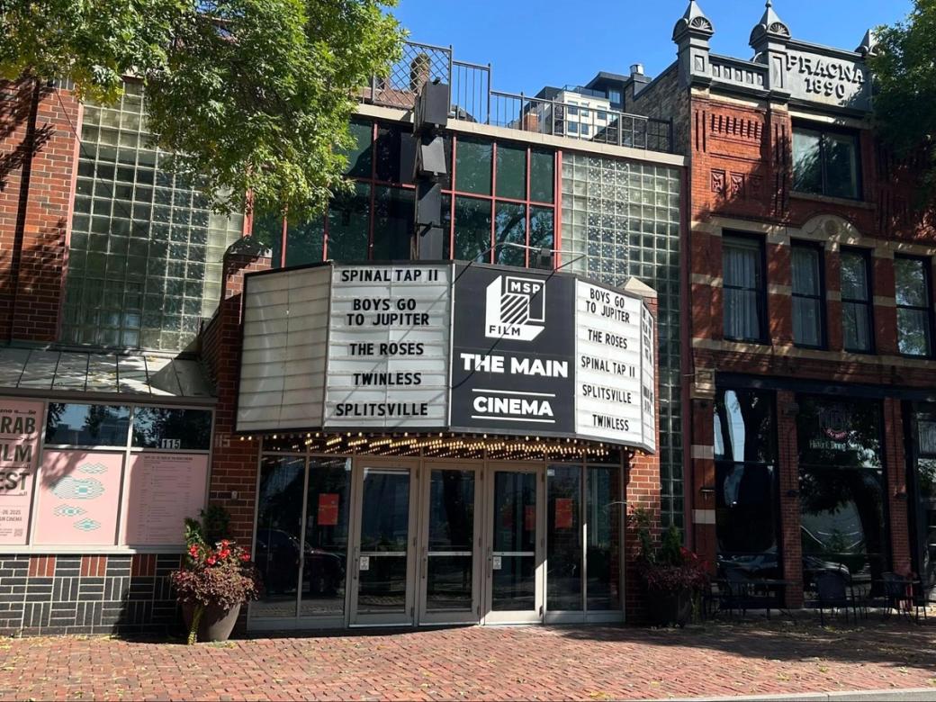 The exterior of The Main Cinema and the cobblestones in front of it.