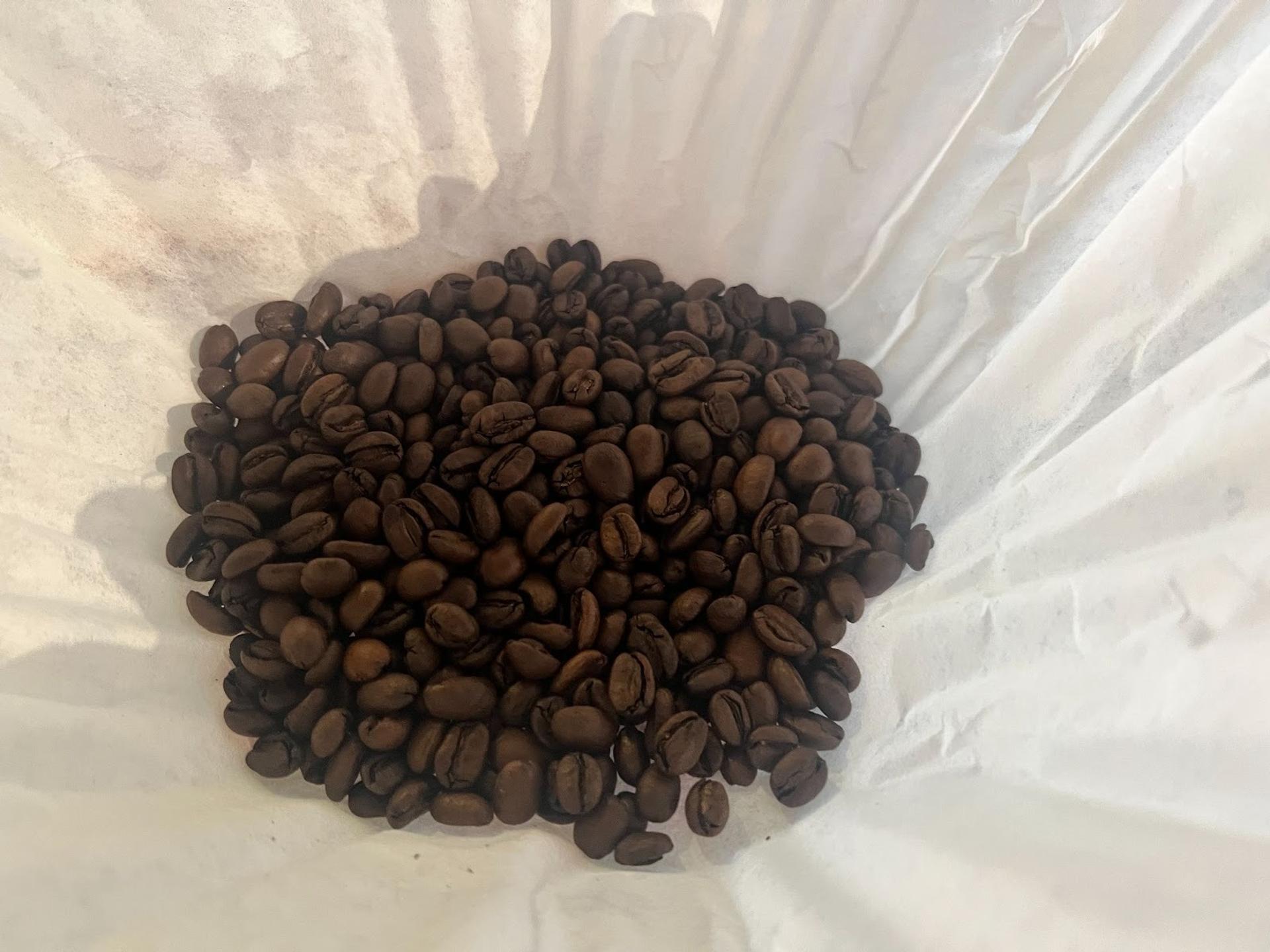 A pile of coffee beans in a filter