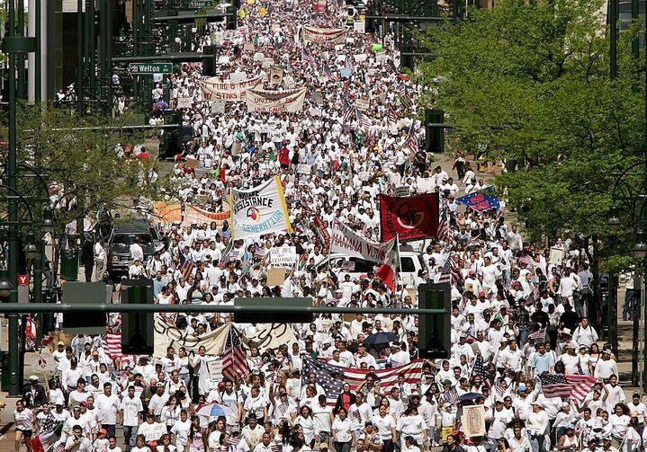 Thousands of demonstrators march from Denver’s Viking Park to the Colorado State Capitol building as part of an immigration rights protest in May 2006.