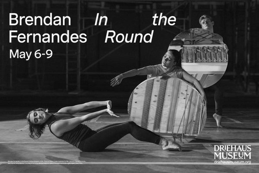 Black and white image of dancers performing with mirrored props on stage. Text reads "Brendan Fernandes In the Round May 6-9, Driehaus Museum."