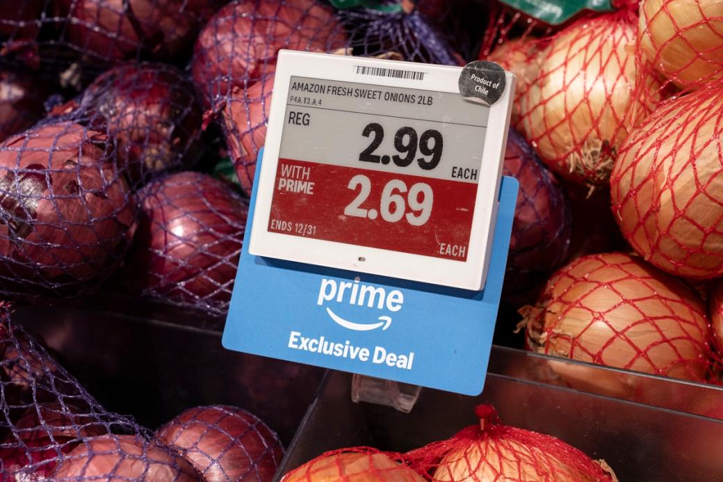An electronic shelf label advertising an exclusive deal on “Amazon Fresh Sweet Onions” for Amazon Prime members is seen an Amazon Fresh grocery store.