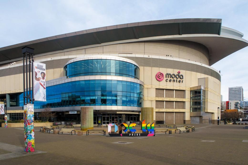 Moda Center with a Rip City sign in trans and gay pride colors with the word “pride.”