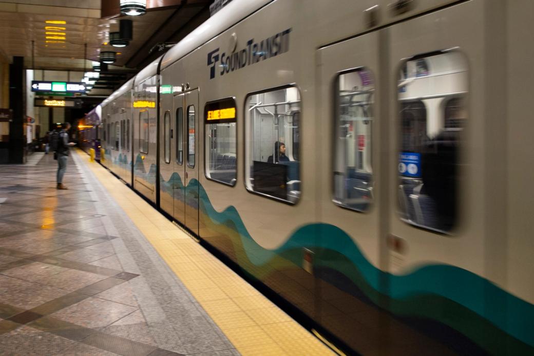 An image of a light rail pulling out of a station