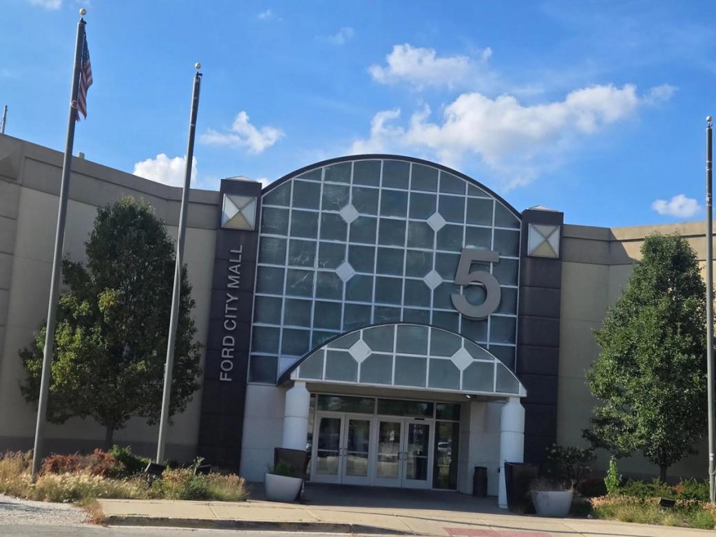 A photo of a building that says "Ford City Mall" and a large "5" on the front as well