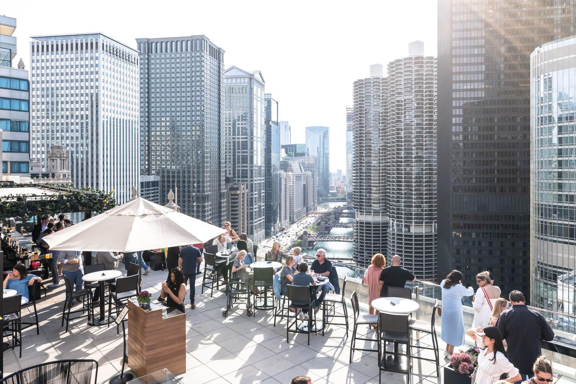 A rooftop bar overlooking skyscrapers