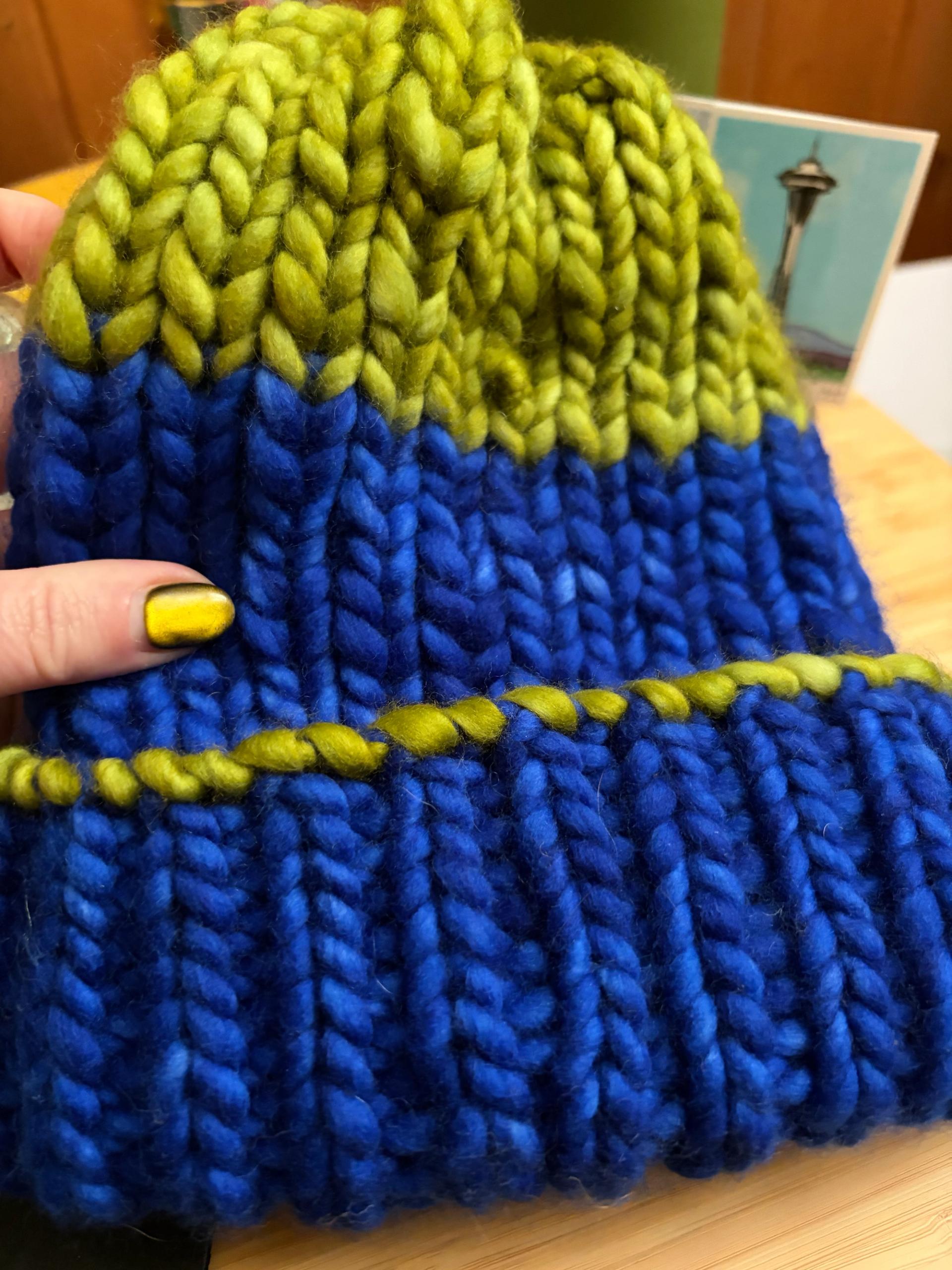 Yes, I do knit my own Seahawks beanies. I contain multitudes! (Ashley Smith / City Cast Seattle)