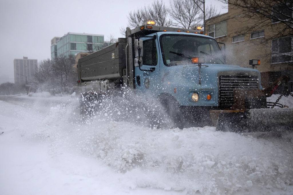 A snowplow clears South Michigan Avenue in Bronzeville in 2021