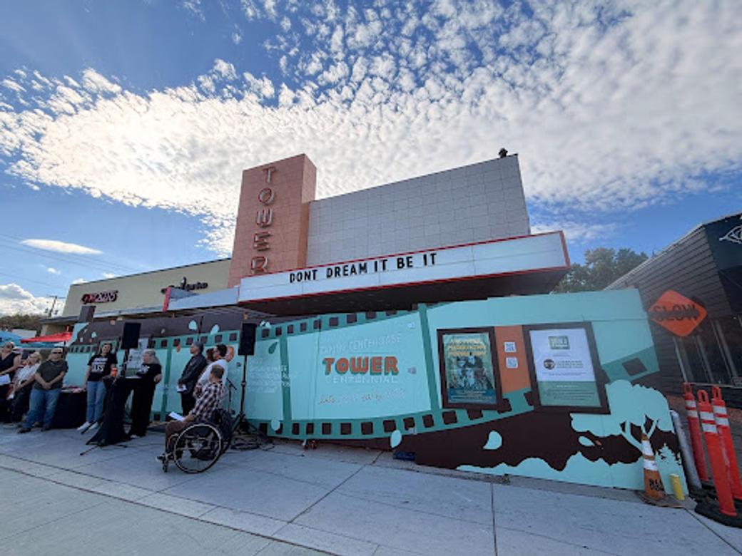 Salt Lake Film Society staff and board members host a press conference in front of the Tower Theatre.