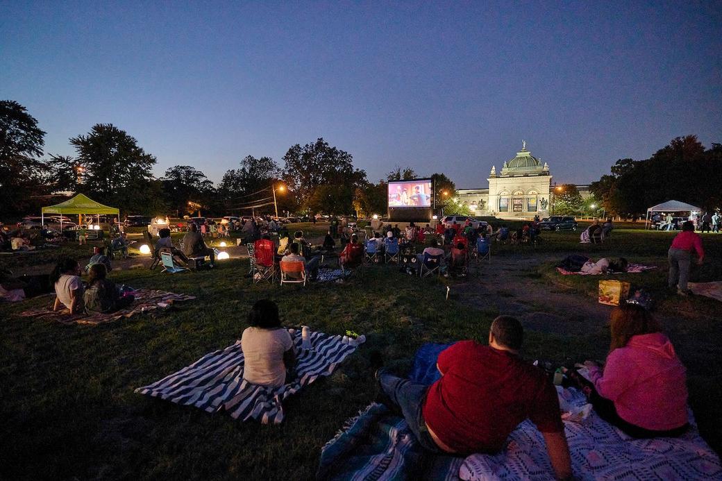 People watch a movie in Fairmount Park