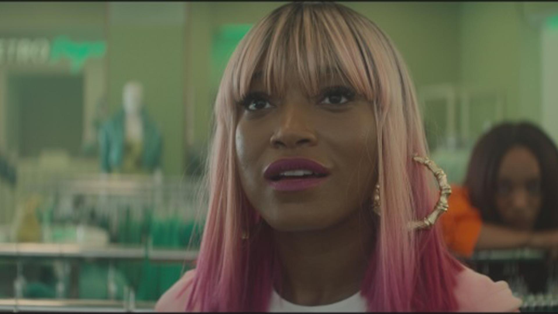 Keke Palmer in a blonde and pig wig with bangs.