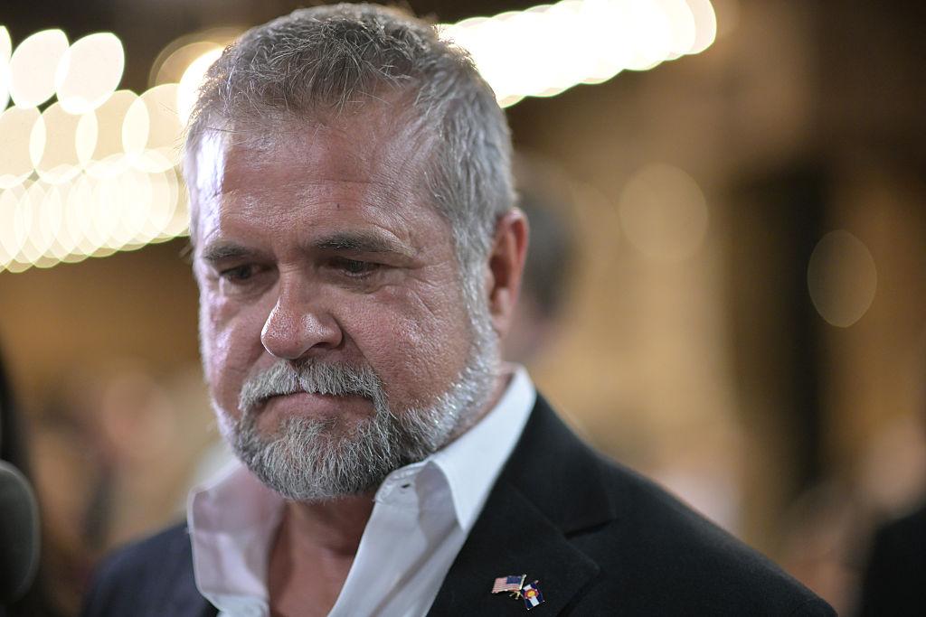 Victor Marx, GOP nominee for governor, looks down and to the right.