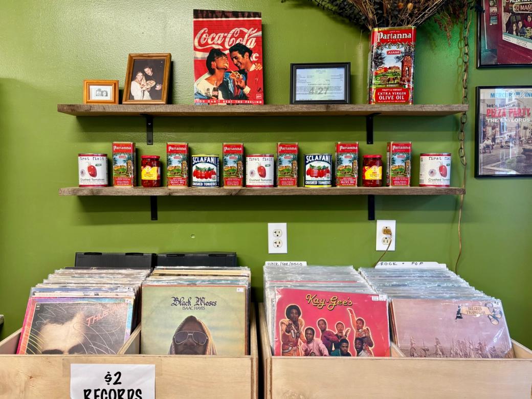 record boxes and shelves with old tomato cans