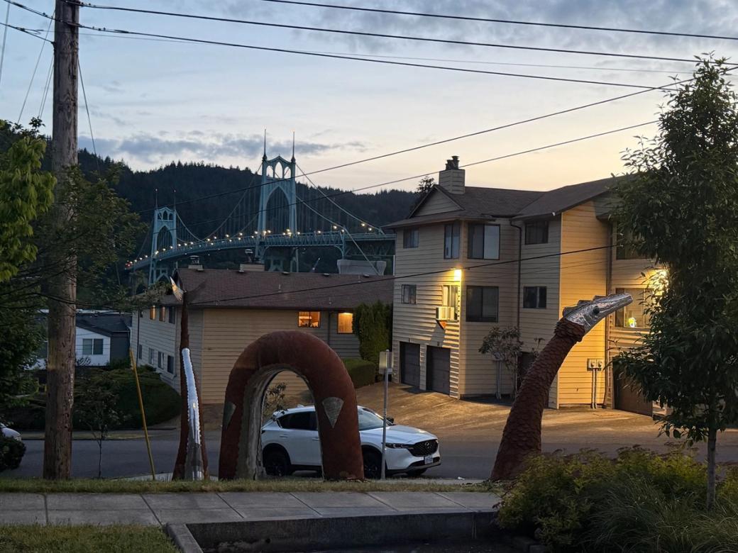 Water serpent sculpture with St. Johns bridge in the background
