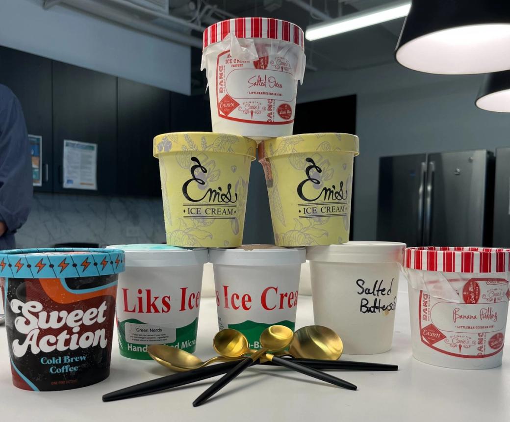 A pyramid of ice cream pints from local Denver ice cream parlors