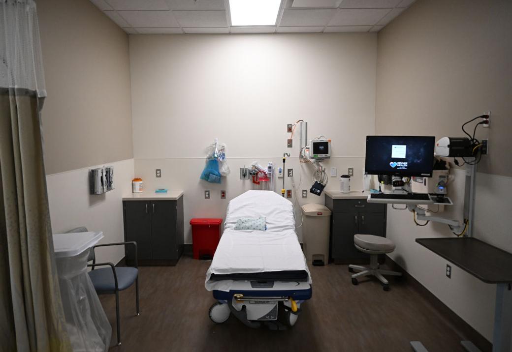 An empty patient bed in a hospital