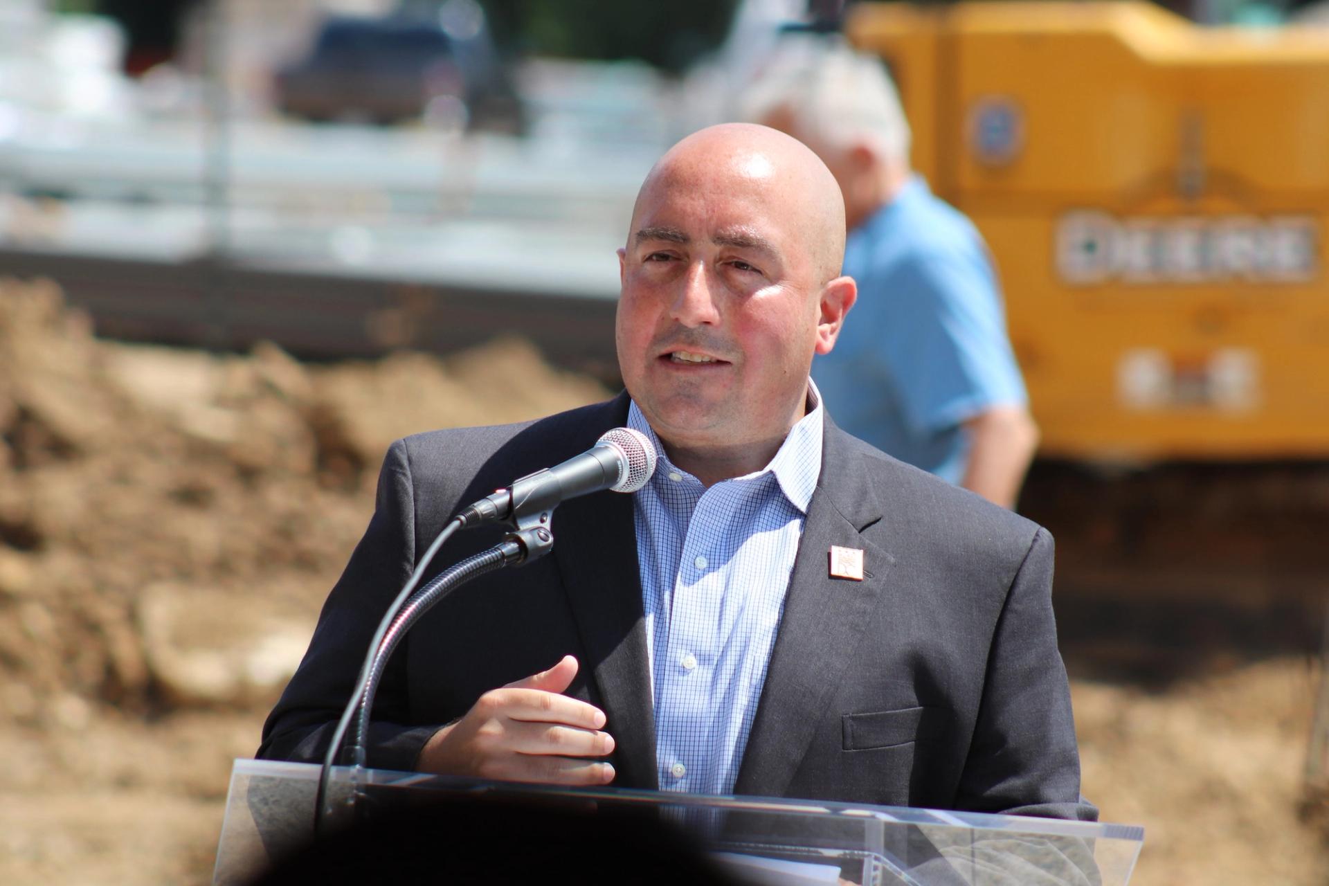 John Falcicchio speaking at a groundbreaking ceremony last year.