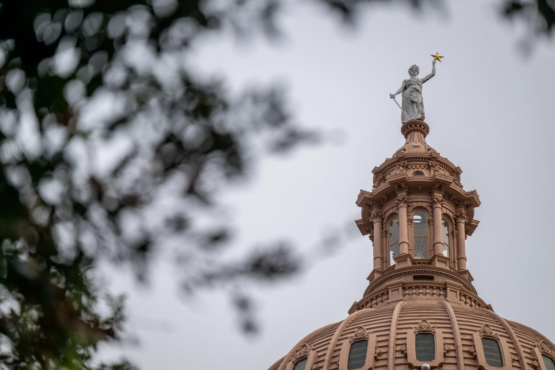 The top of the Texas Capitol building.