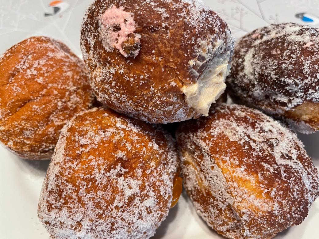 A pile of delicious paczki from Party Cake Shop in Brookline