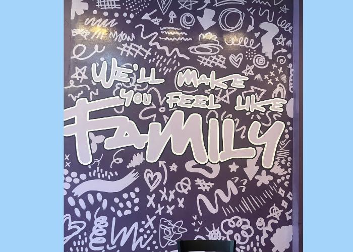 A graffiti-style mural with the word "Family" in the center.
