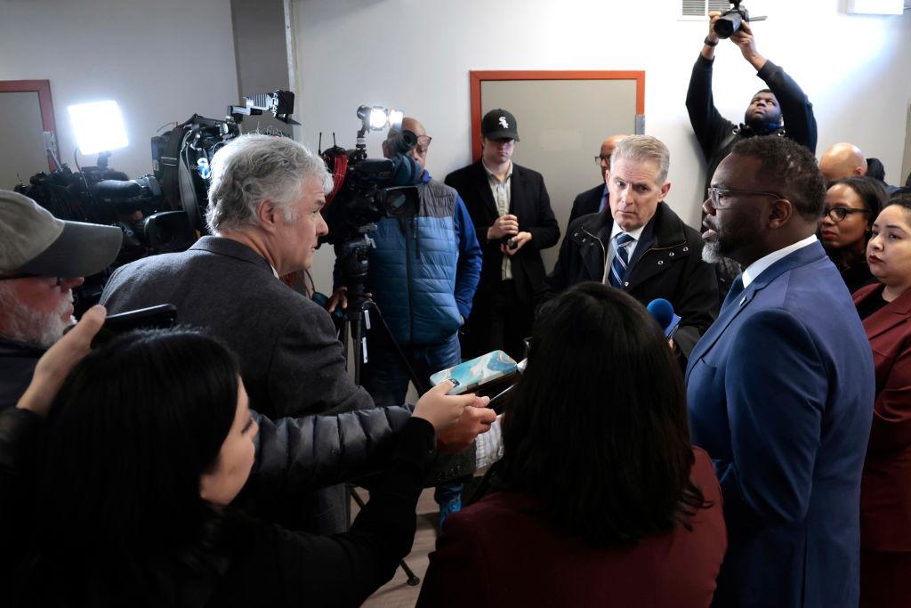 Mayor Brandon Johnson with reporters