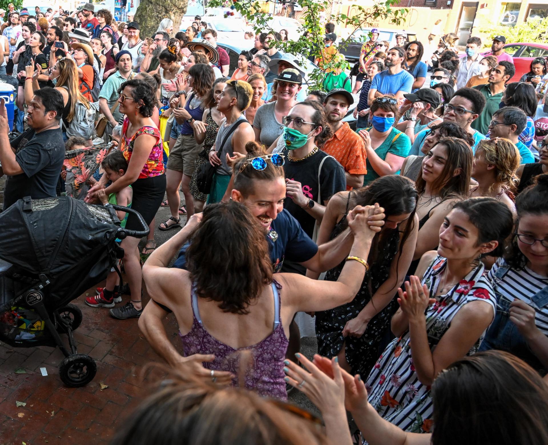 People dancing and listening to music at Porchfest in 2021. (Joe Piette/Flickr)