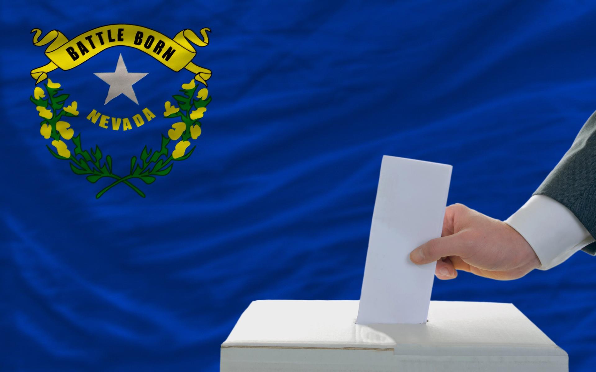 Ballot cast alongside a Nevada state flag.