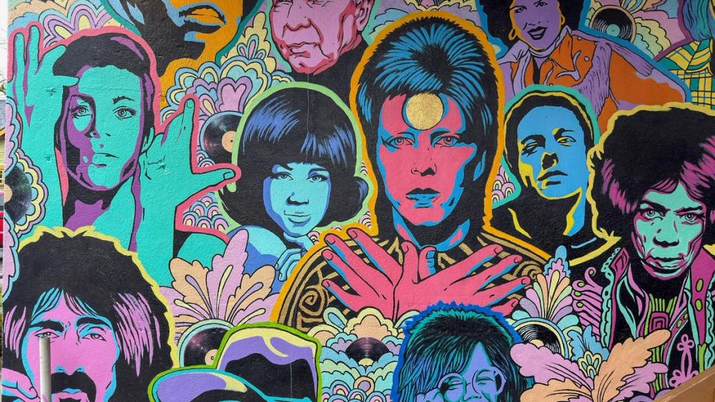 Brightly colored mural of pop stars