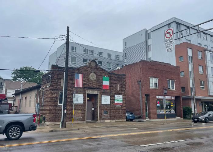 The Italian Workmen's Club under an overcast sky