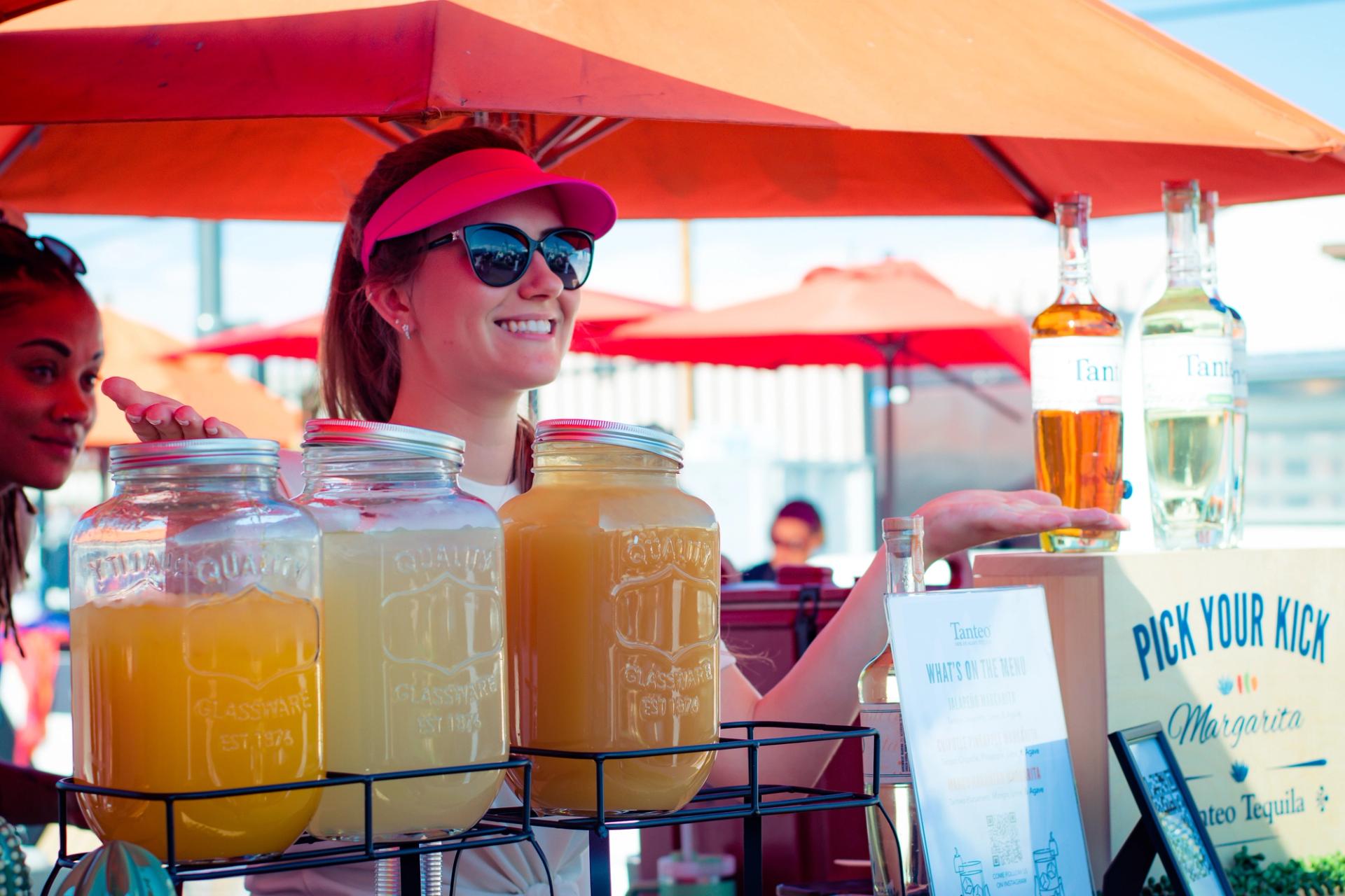A bartender prepares to serve a drink at Picnic in the Alley.