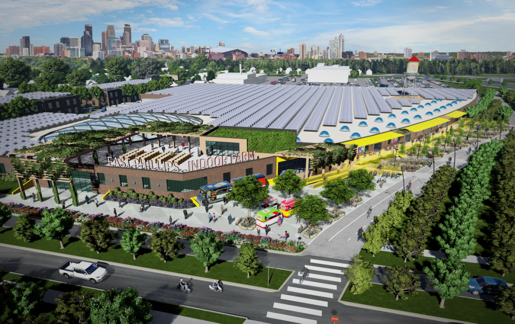 A digital rendering of a large structure with a sign that says East Phillips Indoor Farm. There are solar panels on the roof and trees surrounding the building