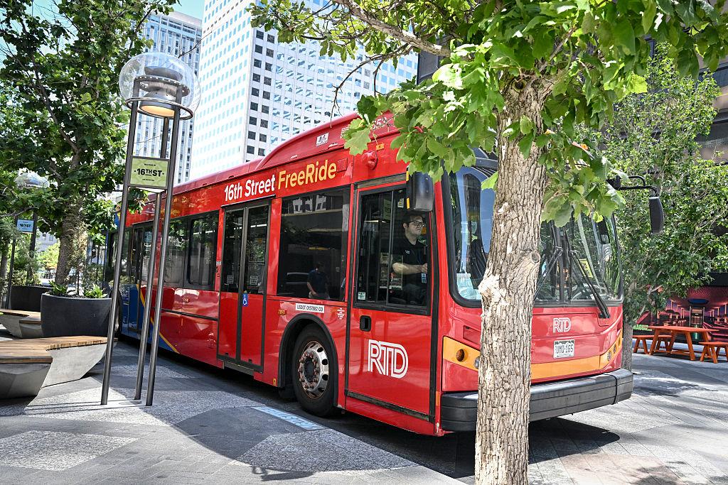 A red 16th Street FreeRide bus.