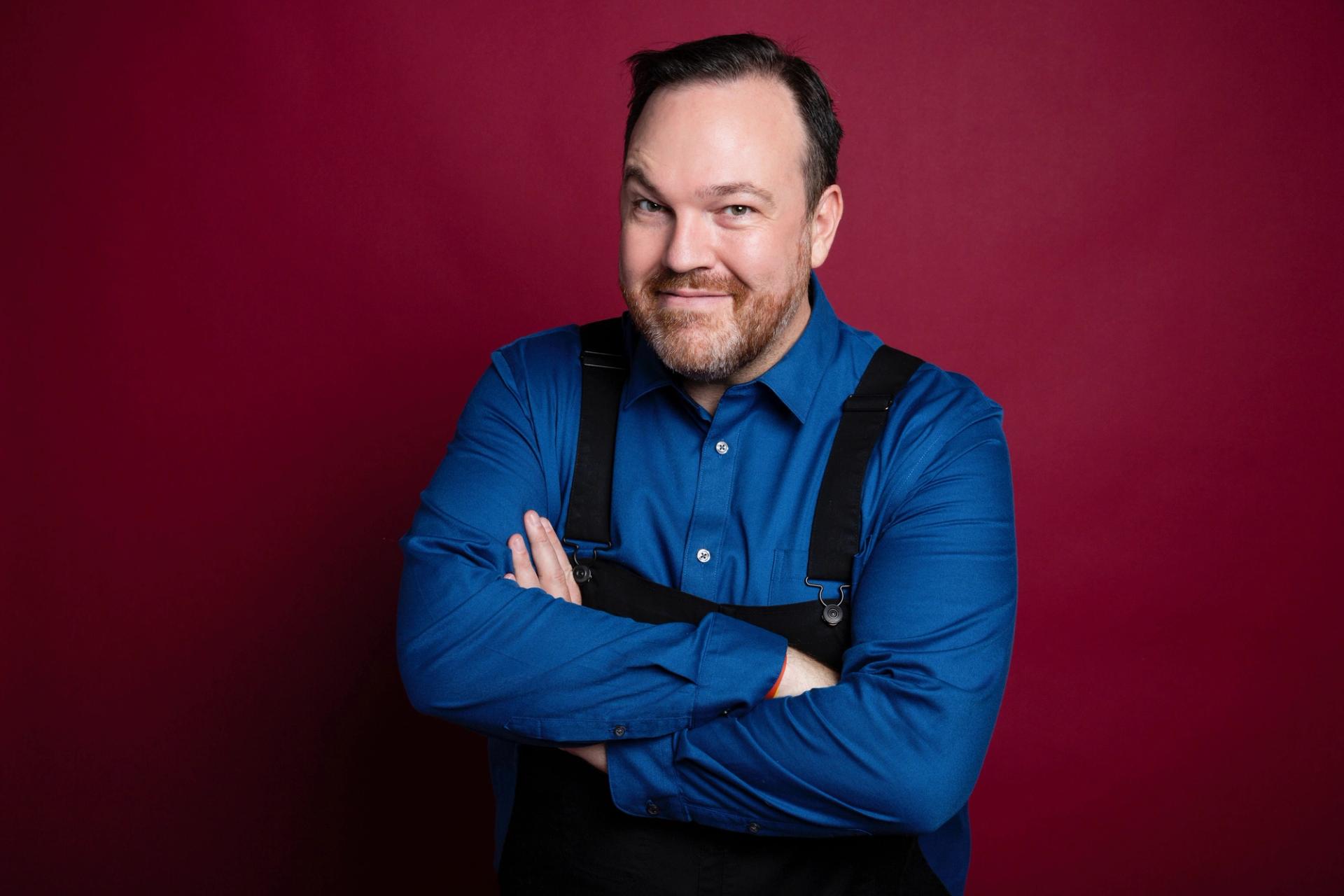 Photo of hands doing magic trick with cards.