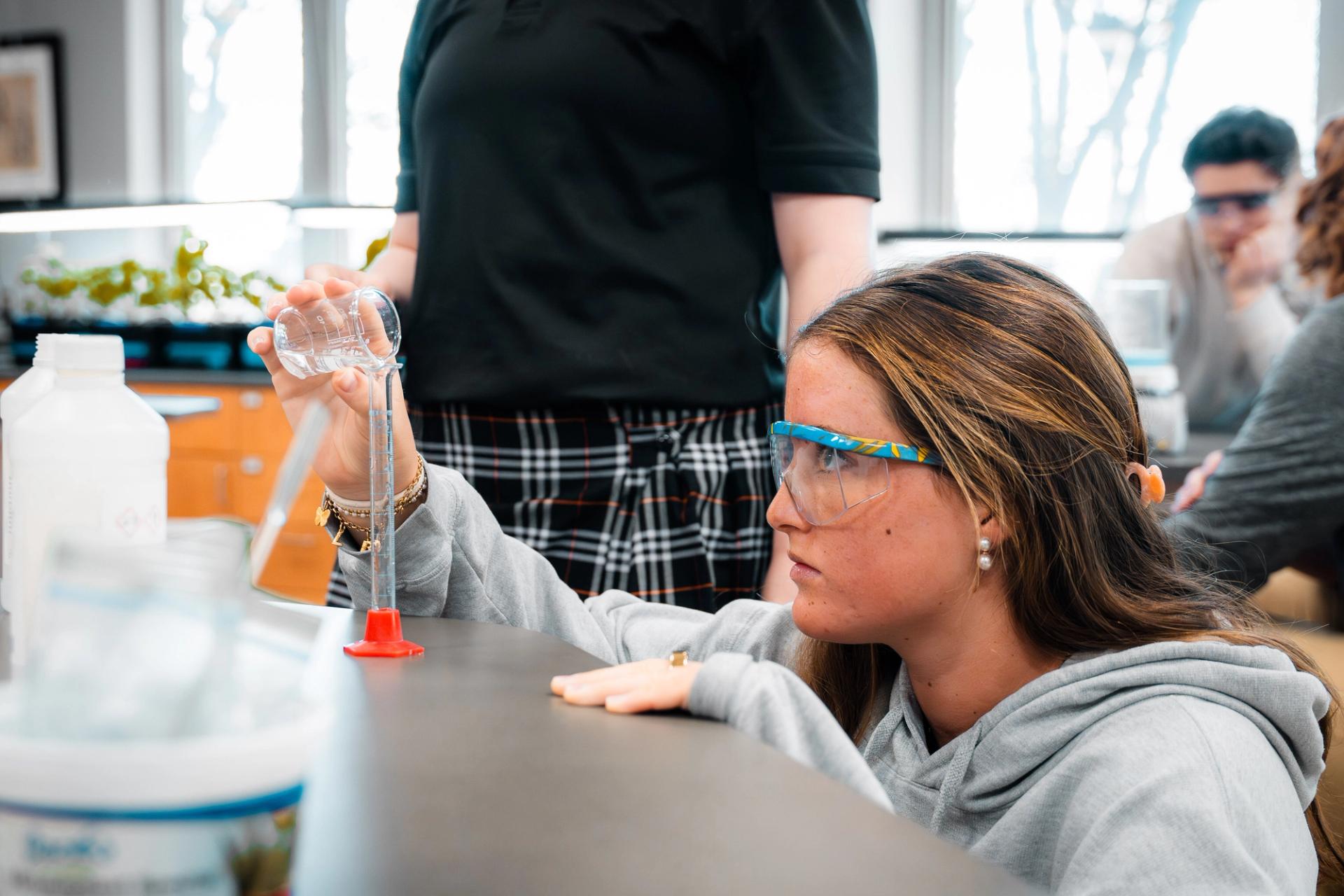 Student doing science experiment 