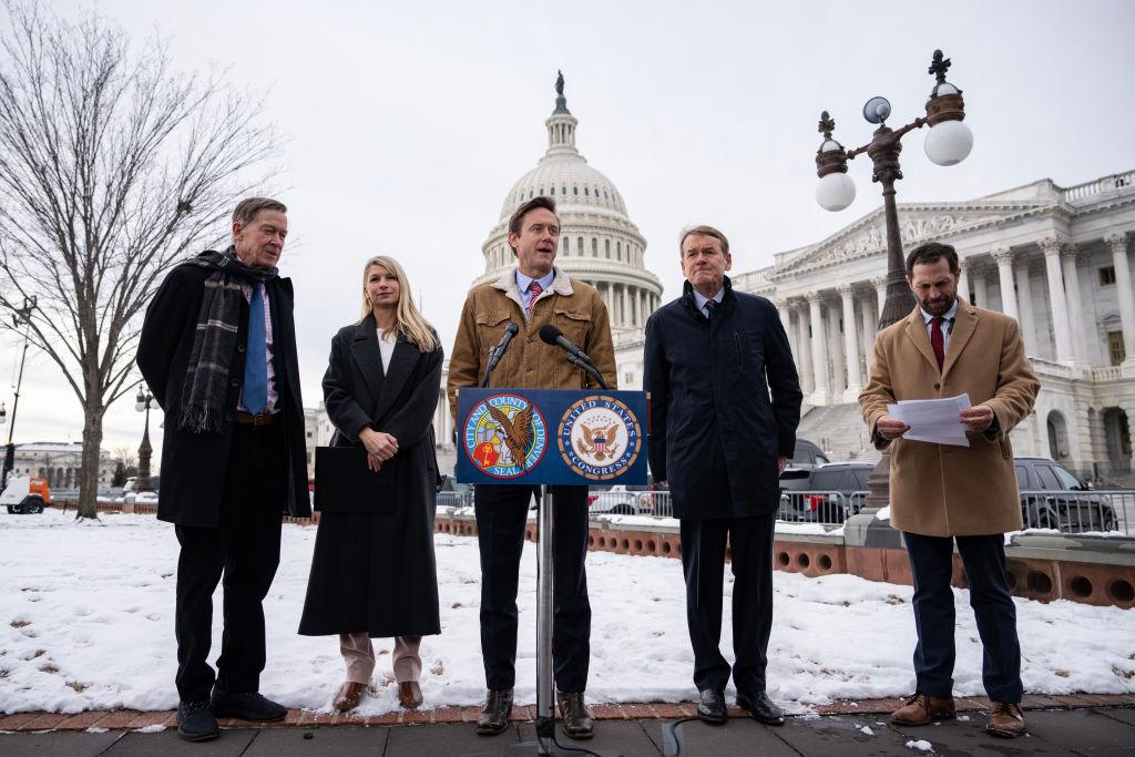 Mayor Mike Johnston speaks at a press conference outside the U.S. Capitol. (Drew Angerer / Getty Images)
