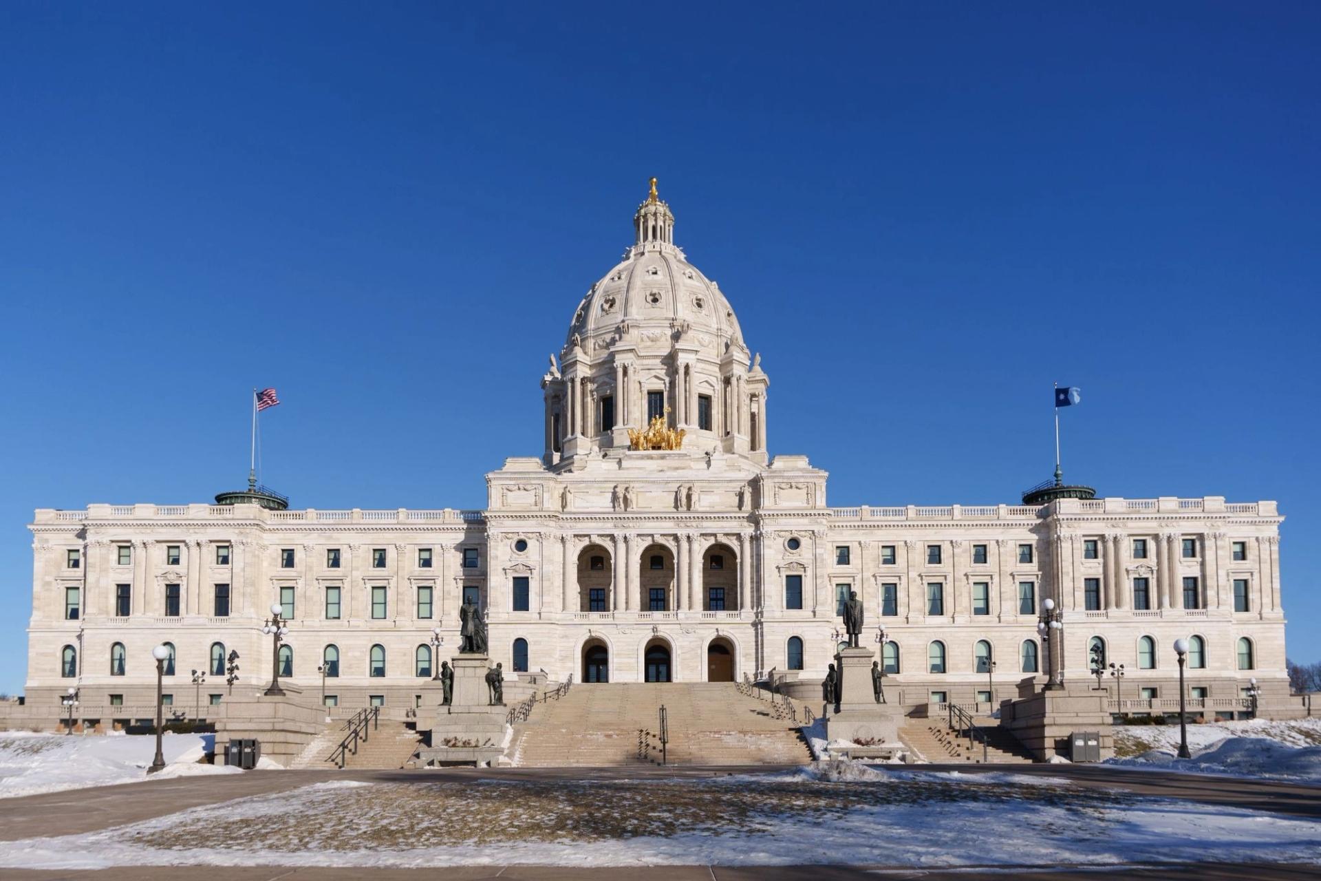 The minnesota state capitol building. It is a large white building