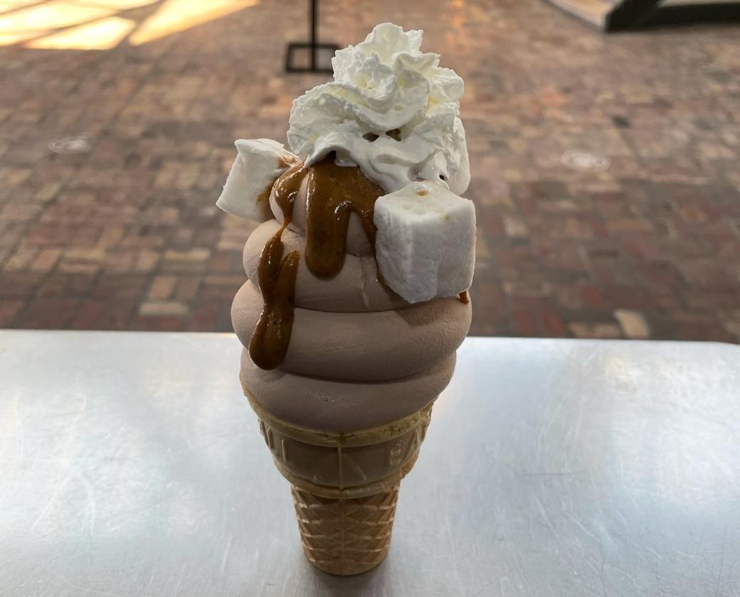 Ice cream cone with toppings.