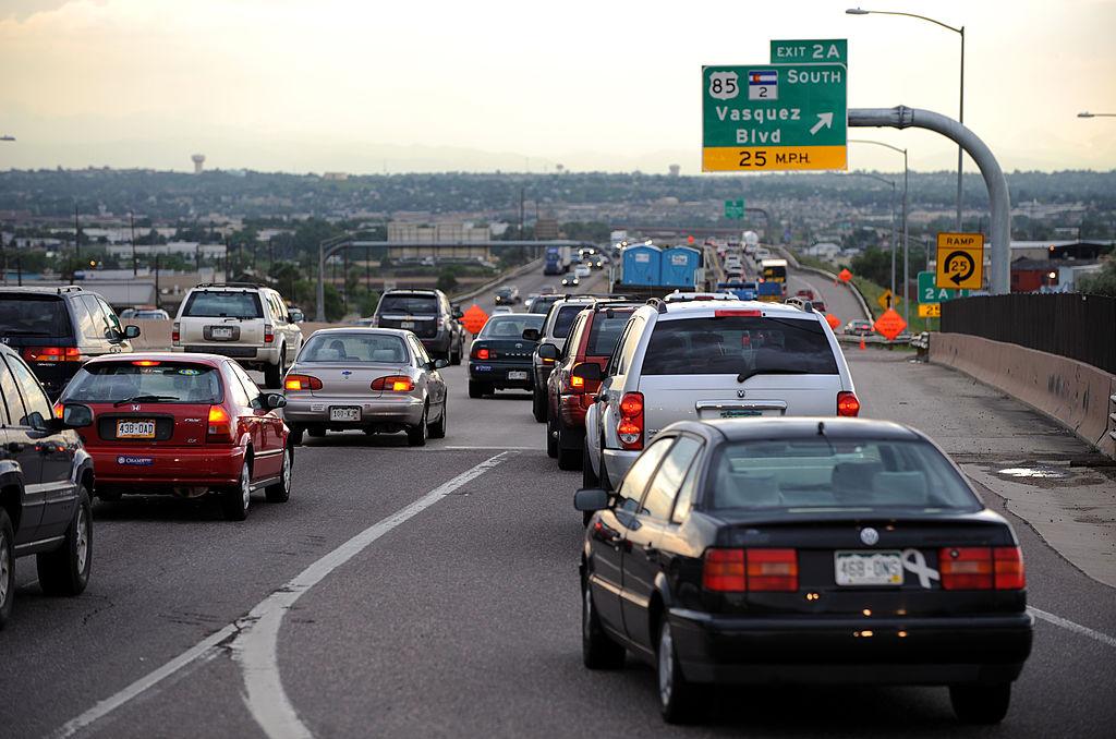Cars and trucks sit in heavy traffic on I-270