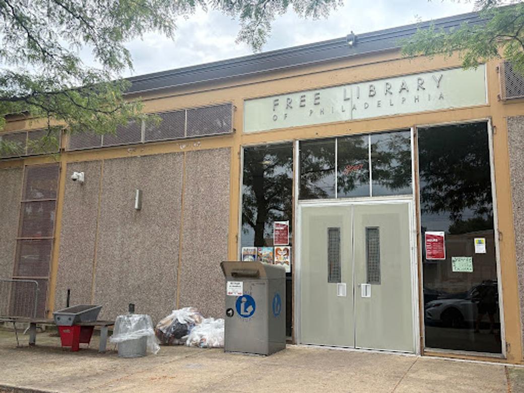 An exterior shot of the front entrance of Cecil B. Moore Library. 