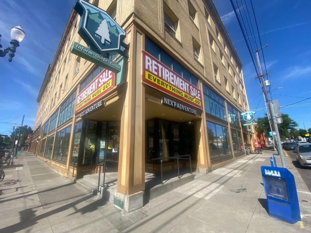 Storefront for Next Adventure with “Retirement Sale” banner.