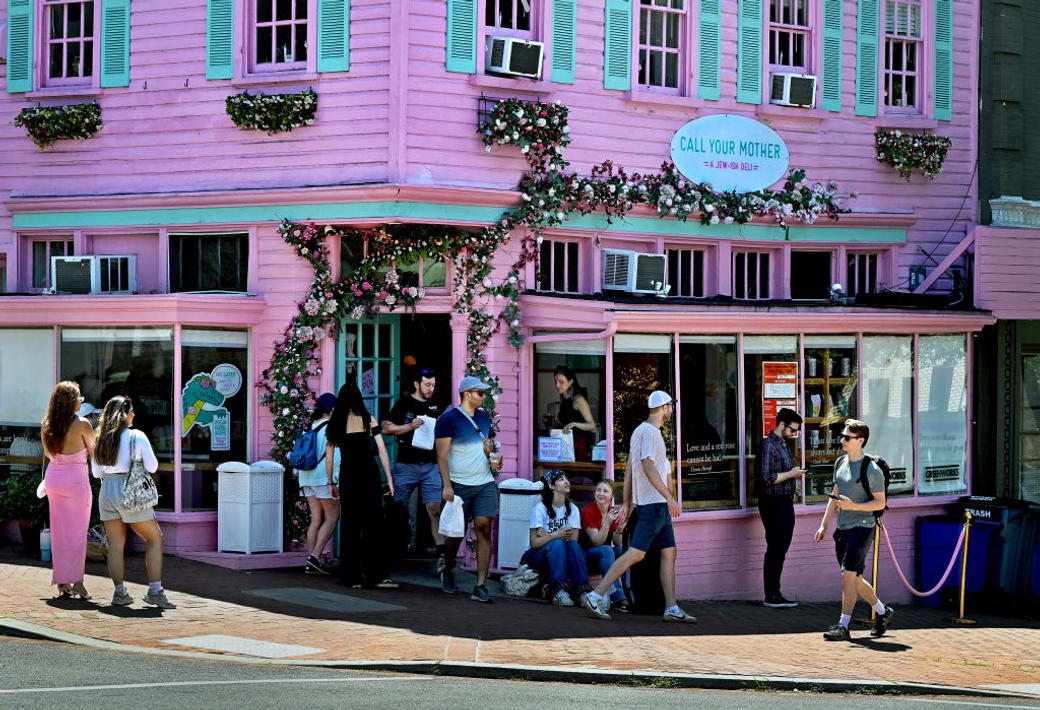 A photo of customers outside a Call Your Mother bagel shop in Washington, D.C. 
