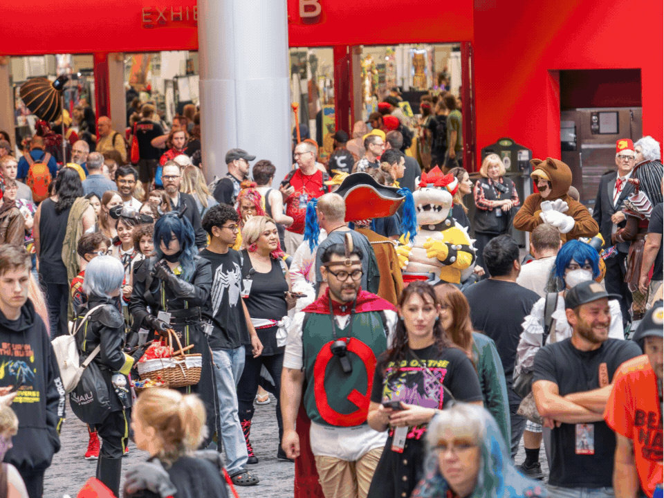 Alternating images show scenes from Rose City Comic Con, including crowds milling about the convention floor, a group photo at the Star Wars experience, and actors from “The Goonies” posing on stage in front of a packed audience.
