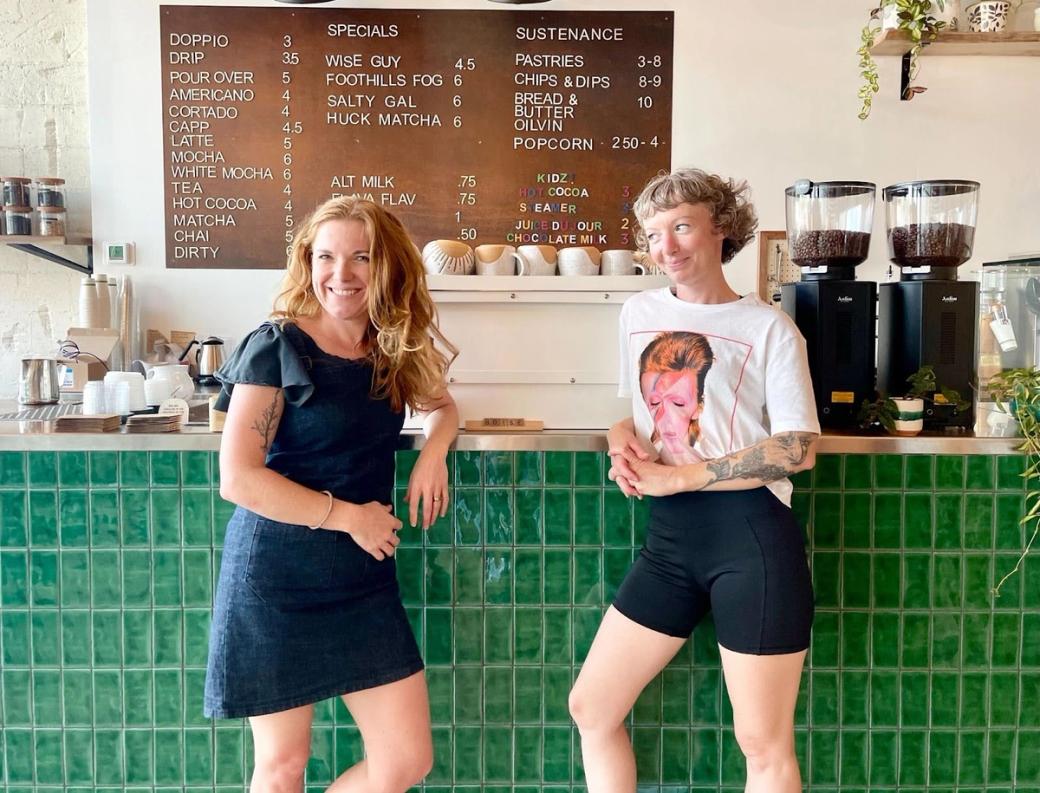 Two women in a coffee shop.