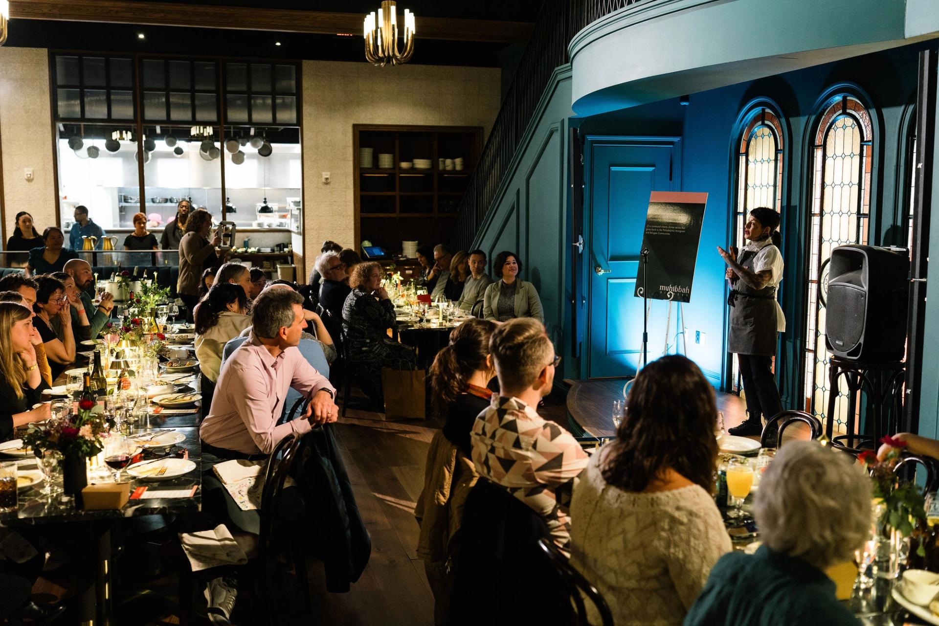 Guests attend a Muhibbah Dinner