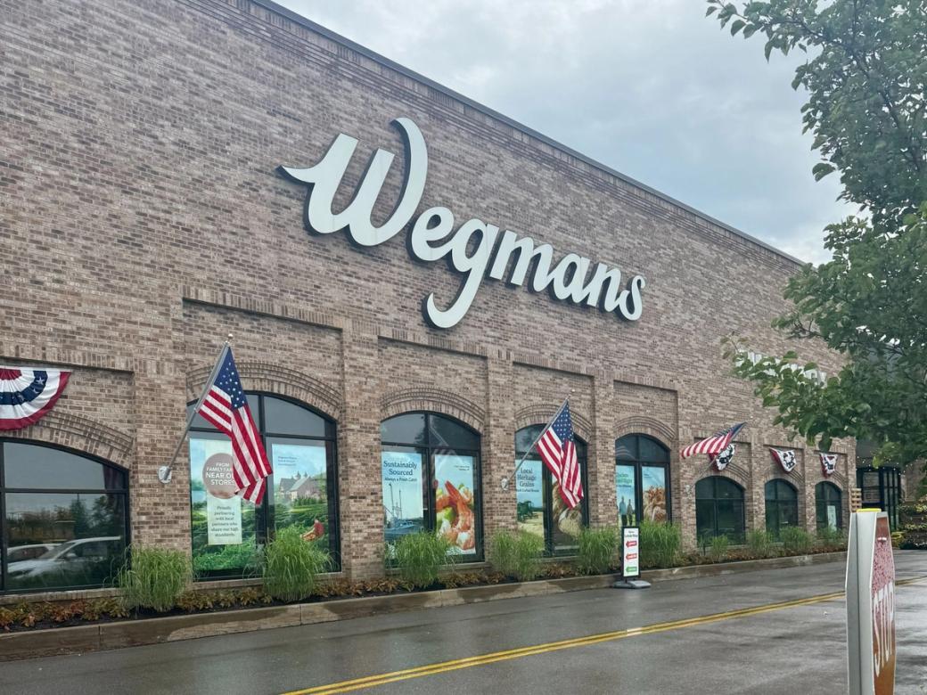 Wegmans storefront on a rainy day.
