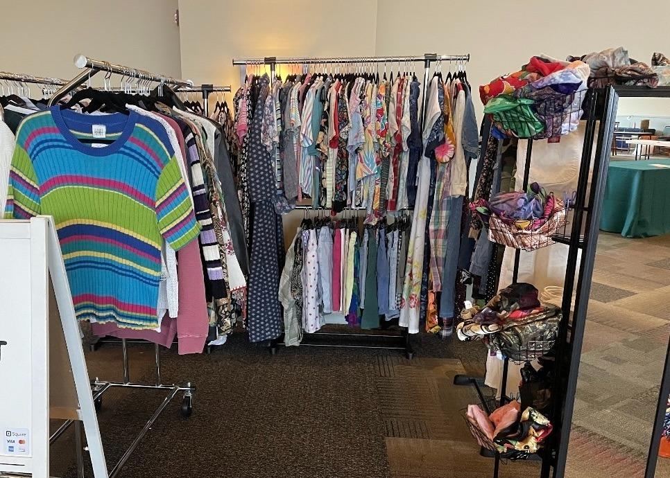 Racks of vintage clothes at a local thrift shop