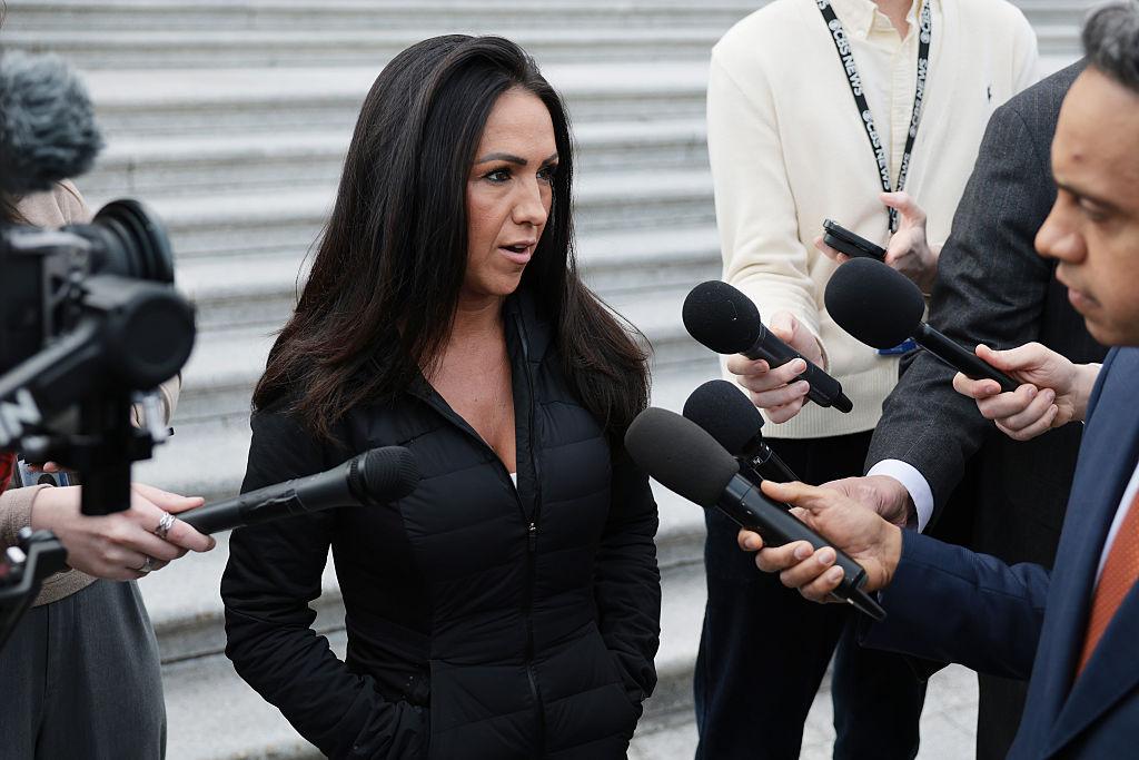 Republican Rep. Lauren Boebert addresses a gaggle of reporters on the steps of the U.S. Capitol