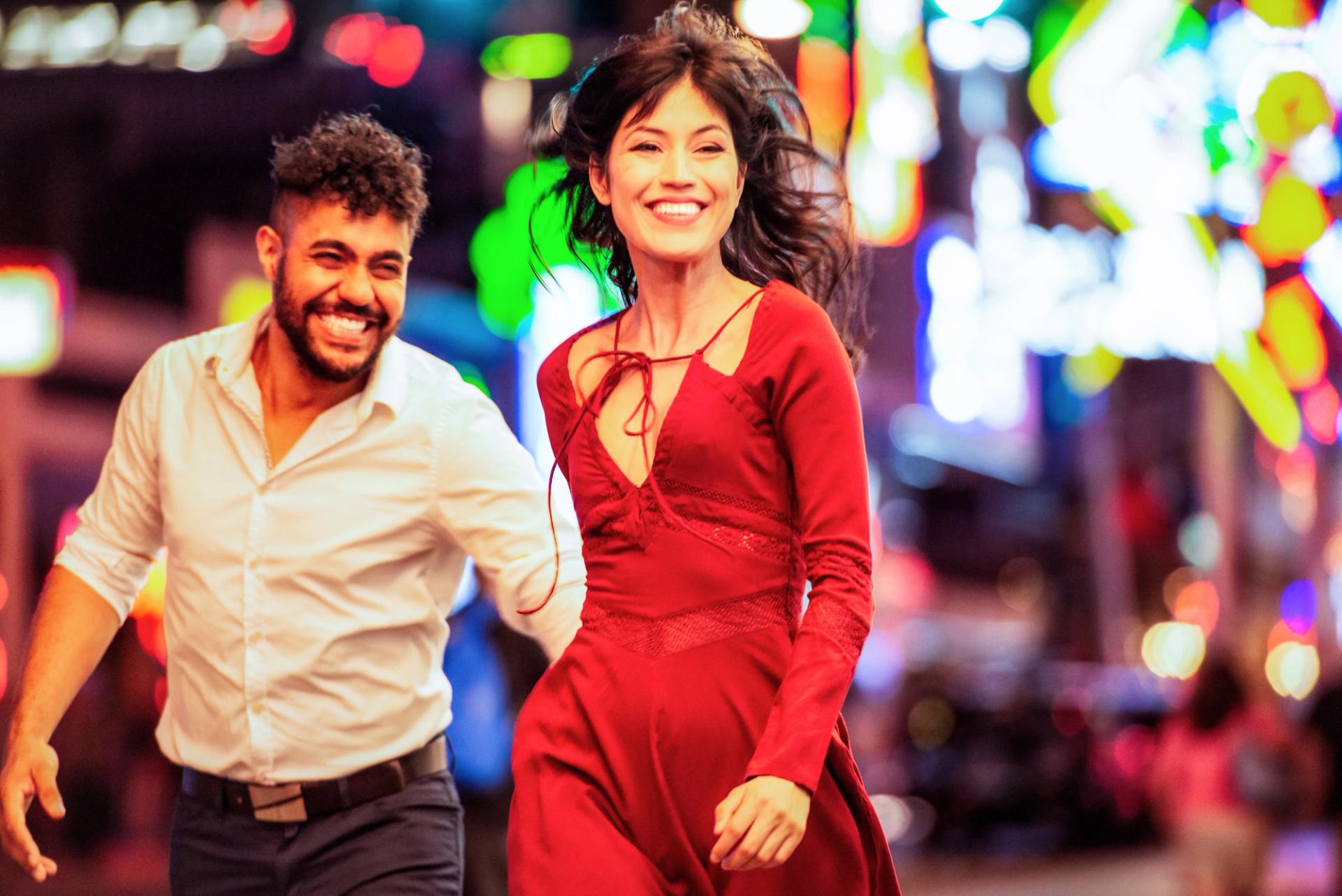 Photo of couple in Las Vegas at night.
