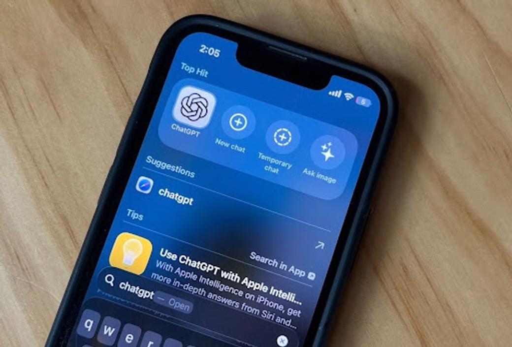 An iPhone displays search results for ChatGPT. 