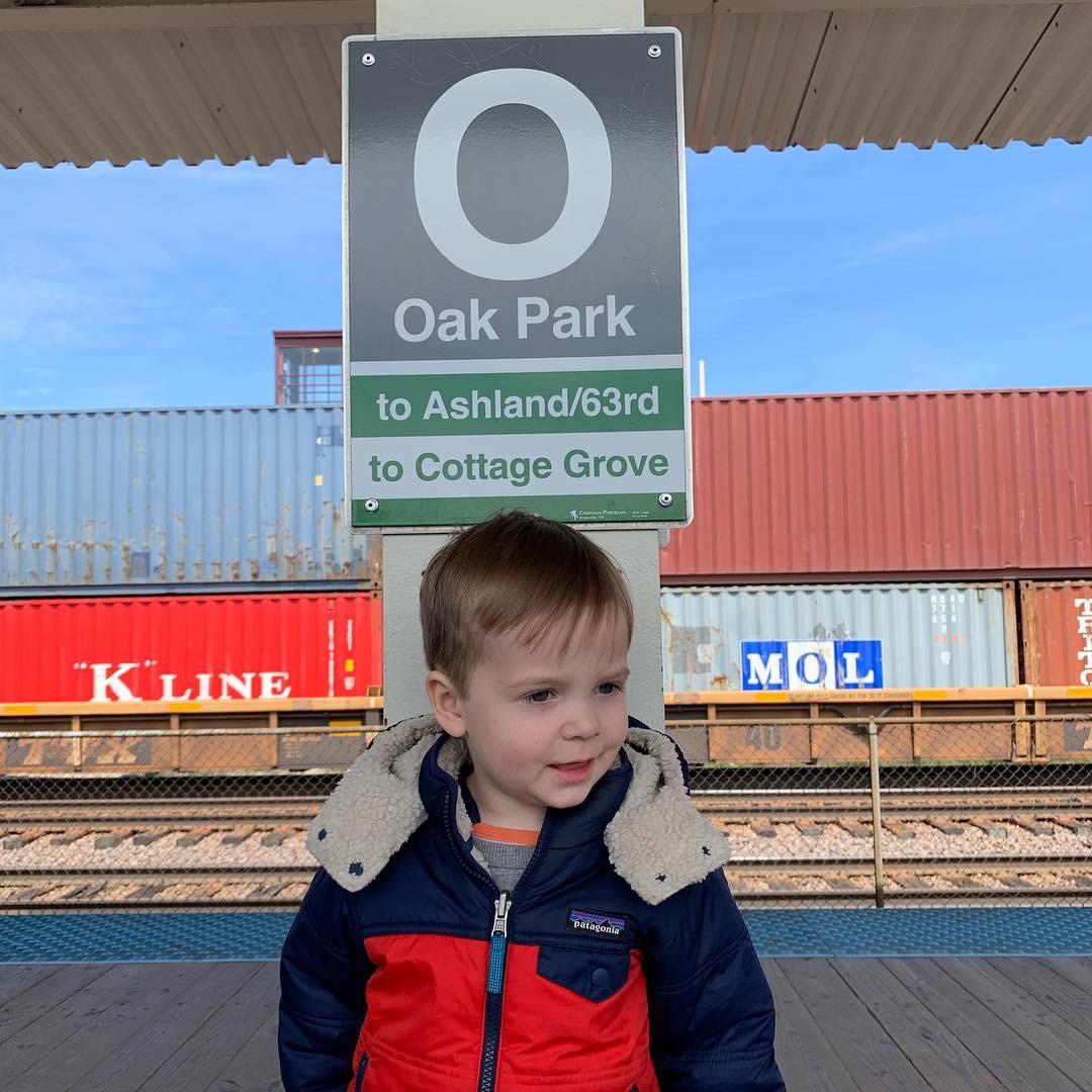A kid at a train station
